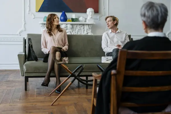 a minister counseling a married couple from Life Church Leander in Leander, TX - Men Bible Study Ministry